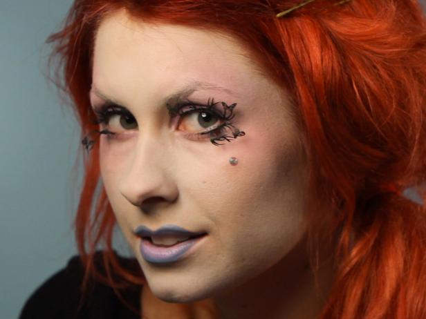 Add a crystal or pearl as a beauty mark under one eye, using clear eyelash glue to adhere it to your skin.