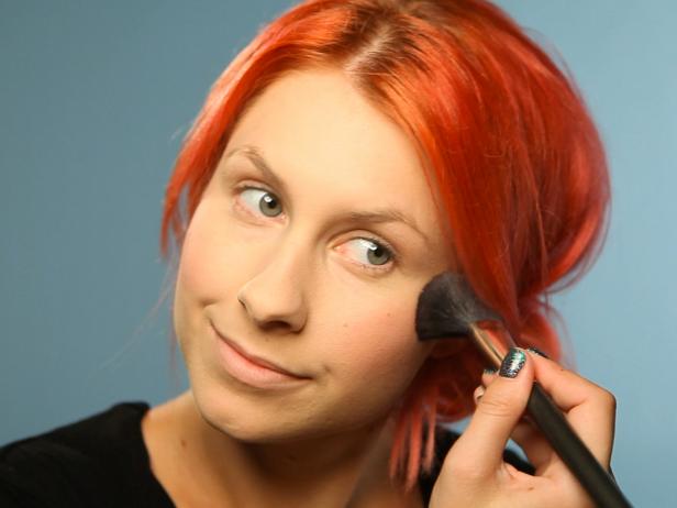 Brush a pink blush over your cheekbones.
