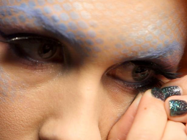 Add a second pair of lashes on the bottom; don't be afraid to use something dramatic.