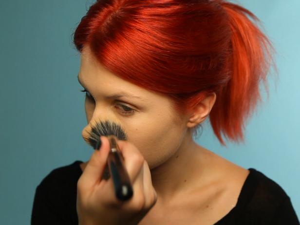 Set foundation with a generous dusting of loose powder for a porcelain finish.