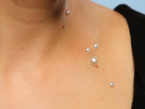 Add stick on pearls to the chest and neck area to create the perfect mermaid costume.