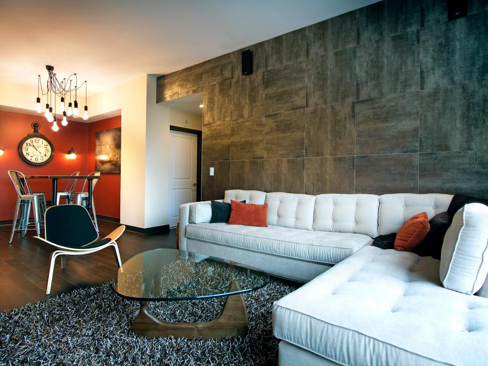 Contemporary Living Space With Gray, Black & Orange Accents