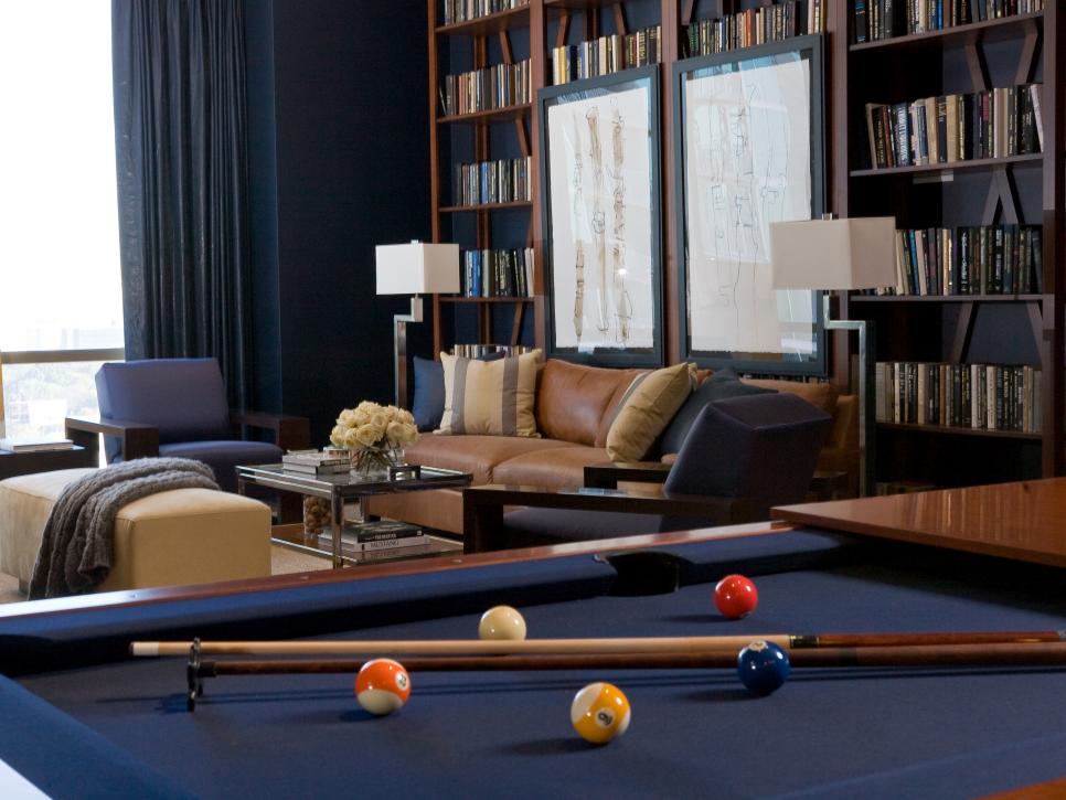 Library with pool table and book shelves