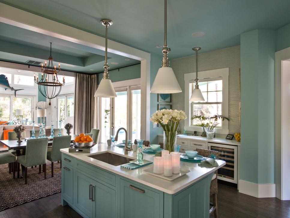 Light Blue Kitchen With Blue Island and Large Pendant Lights 