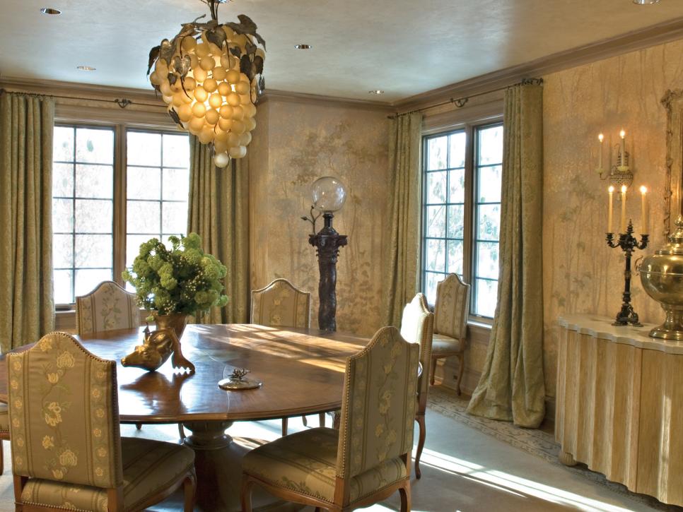 Neutral, Elegant Dining Room With Grape Chandelier and Stag Head Vase