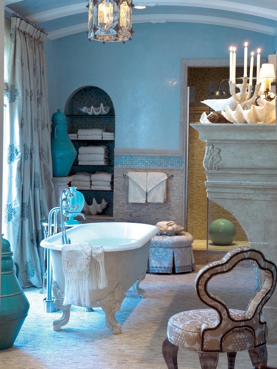 Blue master bathroom with mosaic tile and clawfoot tub