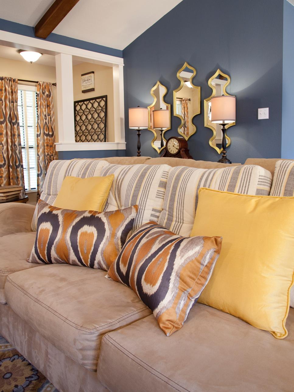 Blue Living Room With Beige Sofa and Gold & Gray Ikat Pillows