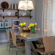 Contemporary Dining Room With Stainless Steel Dining Table