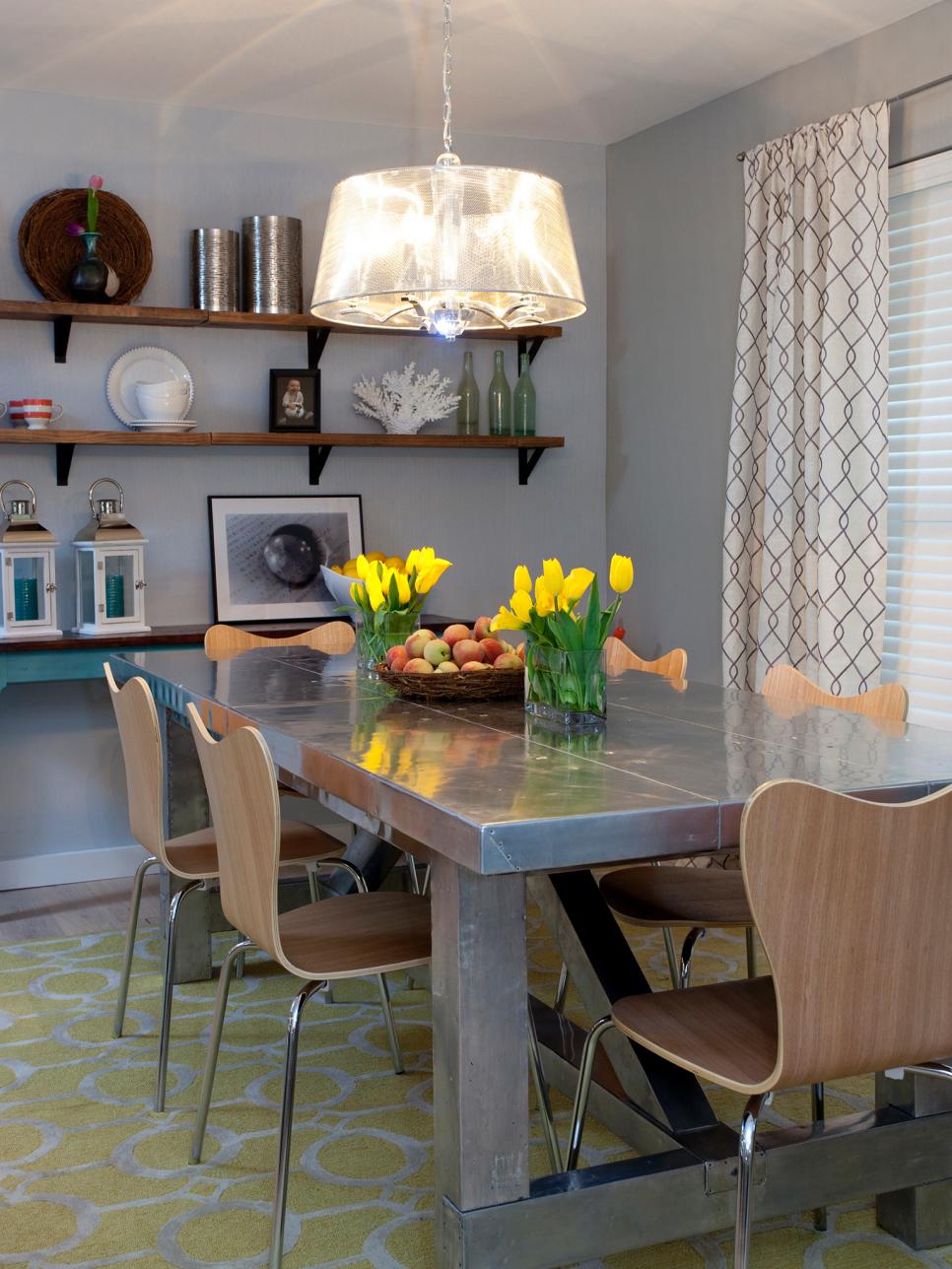 Gray Dining Room With Stainless Steel Dining Table and Shelves