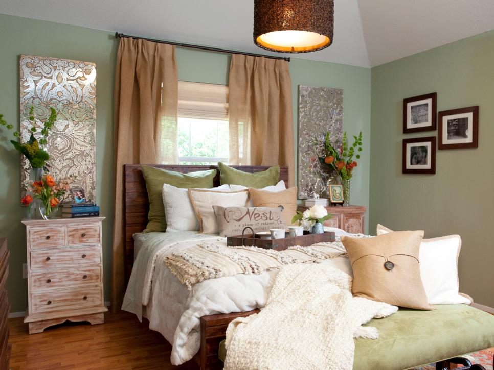 Mint Country Bedroom With Laminate Flooring and Throw Pillows