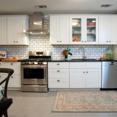 Contemporary White Kitchen With Subway Tile Backsplash