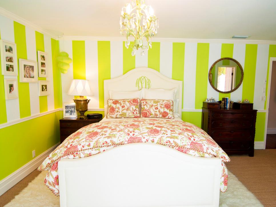 Eclectic Bedroom With Lime Green Striped Walls and Floral Bedding