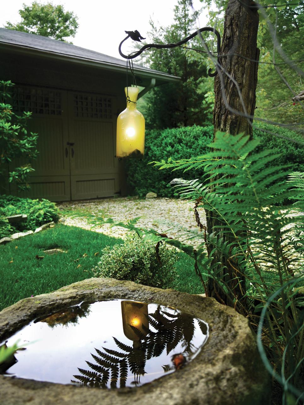 Upcycled Bottle Lantern Yellow Bottle Lantern in Outdoor Scene