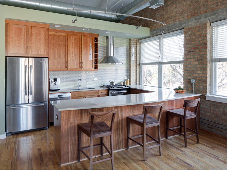 Green Contemporary Eat-In Kitchen With Brick Wall and Exposed Ductwork