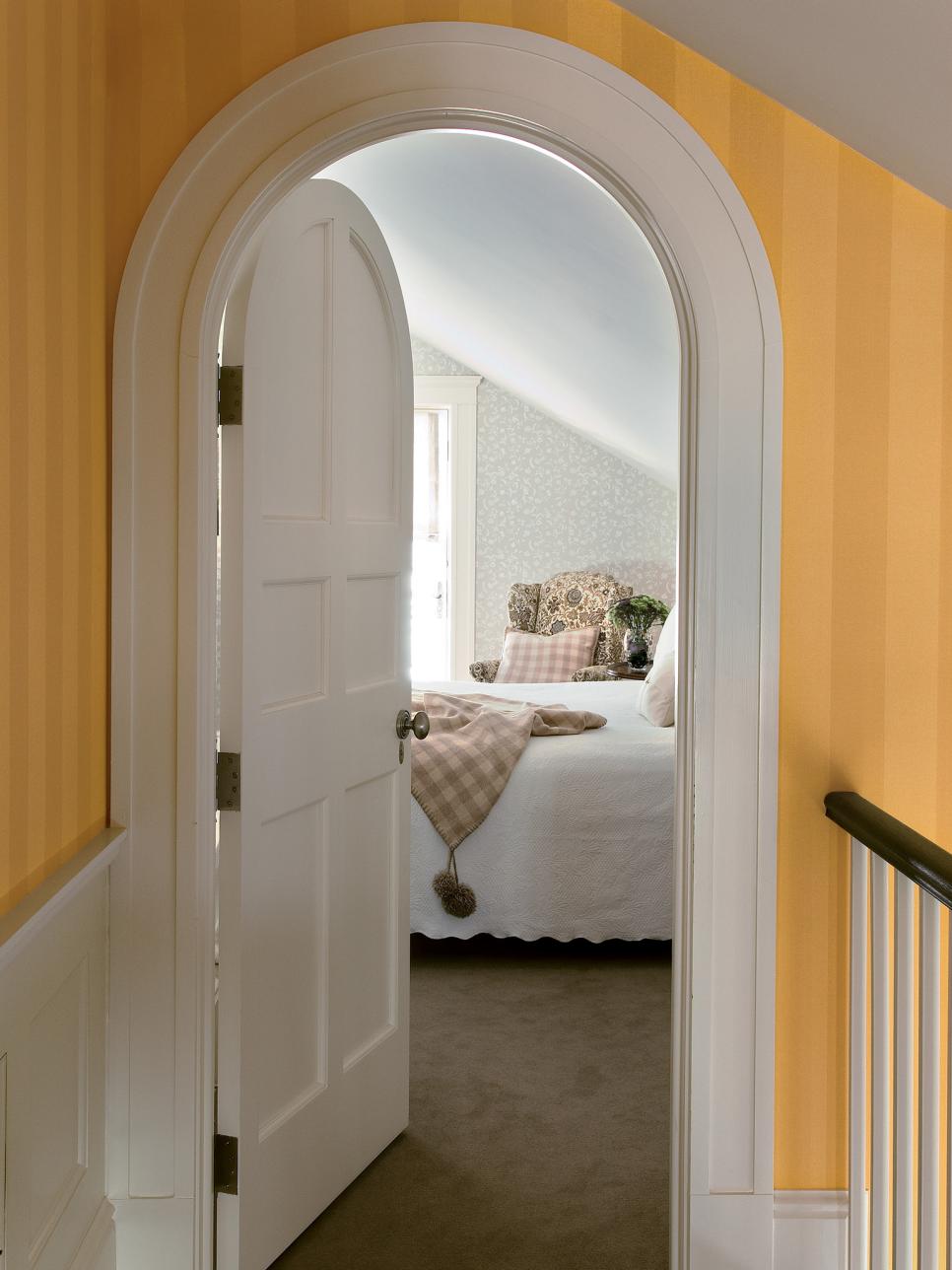 Arched Doorway with Yellow Striped Wallpaper