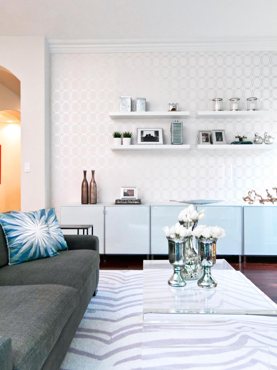 White Living Room With Metallic Patterned Wallpaper & Zebra Rug