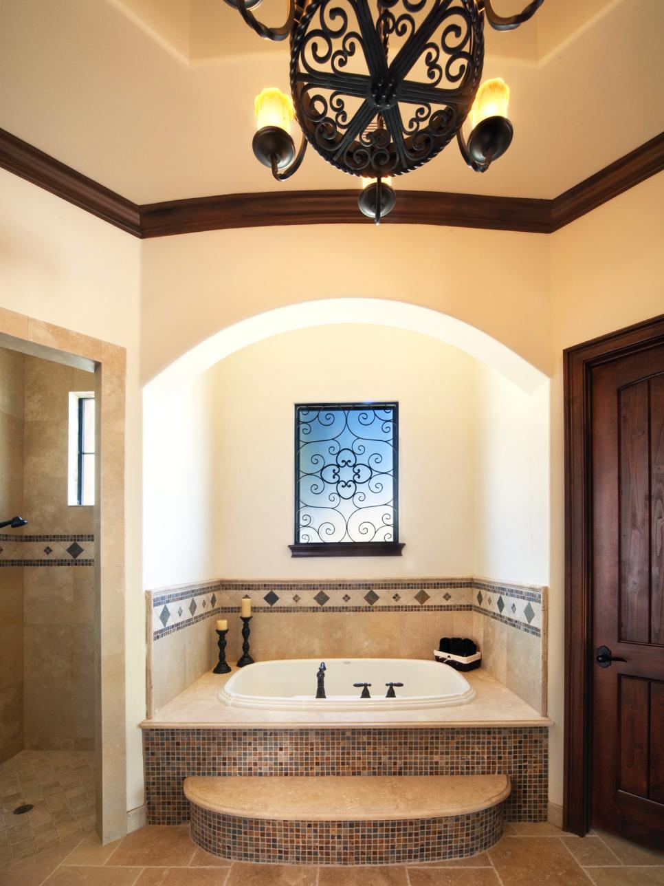 Brown Transitional Master Bathroom With Tiled Soaking Tub