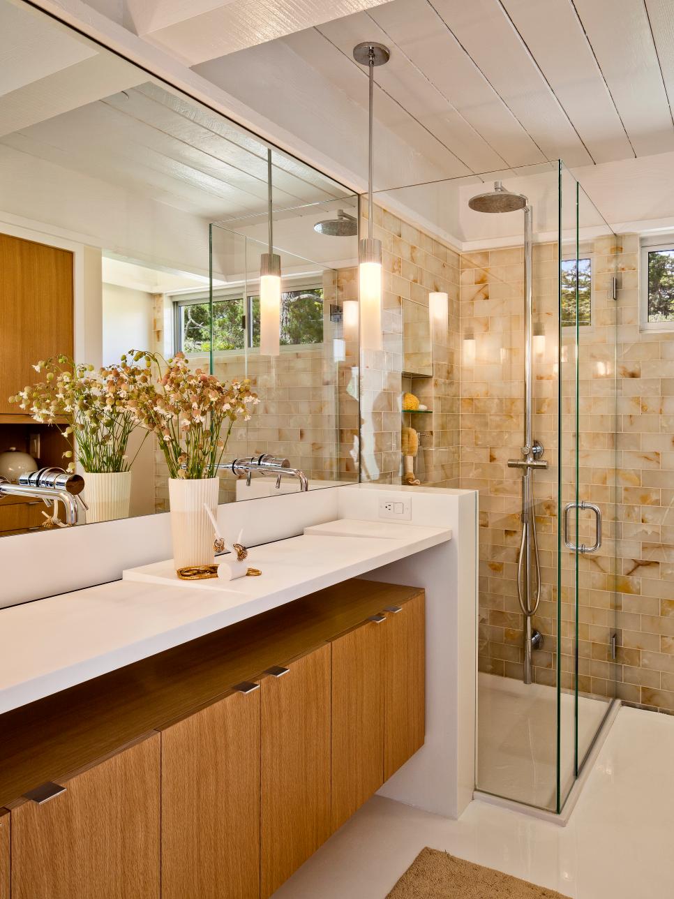 Bathroom With Neutral Tile Walls, Contemporary Vanity and Glass Shower