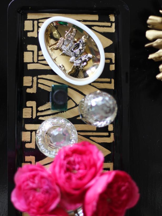 This bird's-eye, partial view of a DIY Art Deco vanity tray, illustrates the level of sophistication and artistry visible in this do-it-yourself design. Objects seem to sparkle as they are placed on the tray.