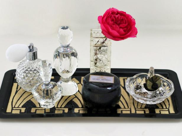 Once your have completed all the steps to create your Art Deco vanity tray, finish by arranging all of your beautiful perfume bottles across its surface. We especially love it styled with glass and crystal containers and a vase of fresh, colorful flowers.