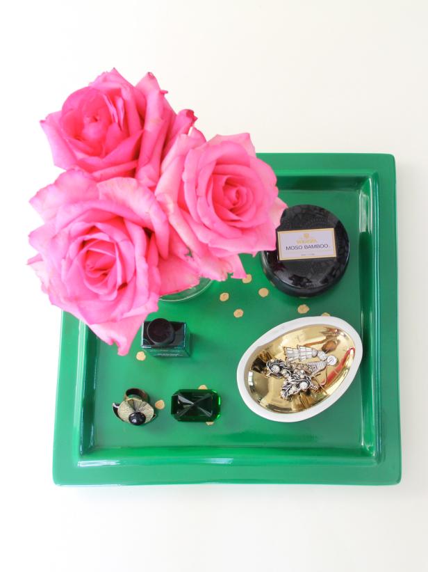 This beautifully-crafted vanity tray with gold constellation dots not only can serve its purpose on a dresser or vanity, but could also used as wall decor, by combining a group of constellation-dot trays in a symmetrical or asymmetrical collage. Either way, it is a simple but stunning do-it-yourself project.