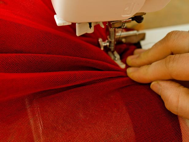 Woman sewing tulle