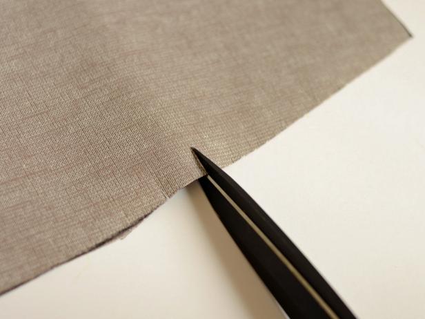 Cut pieces out with sharp scissors, then cut small slits into both sides of center piece where it will meet side pieces.