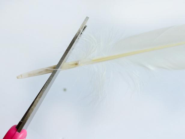 Step 4C is to use scissors to clip the feathers' ends to about 1/2" - 3/4" long for a better fit once they are inserted in the slits of the foam core board.