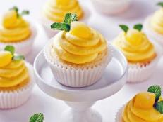 Lemon Cupcakes on a White Cake Stand. 