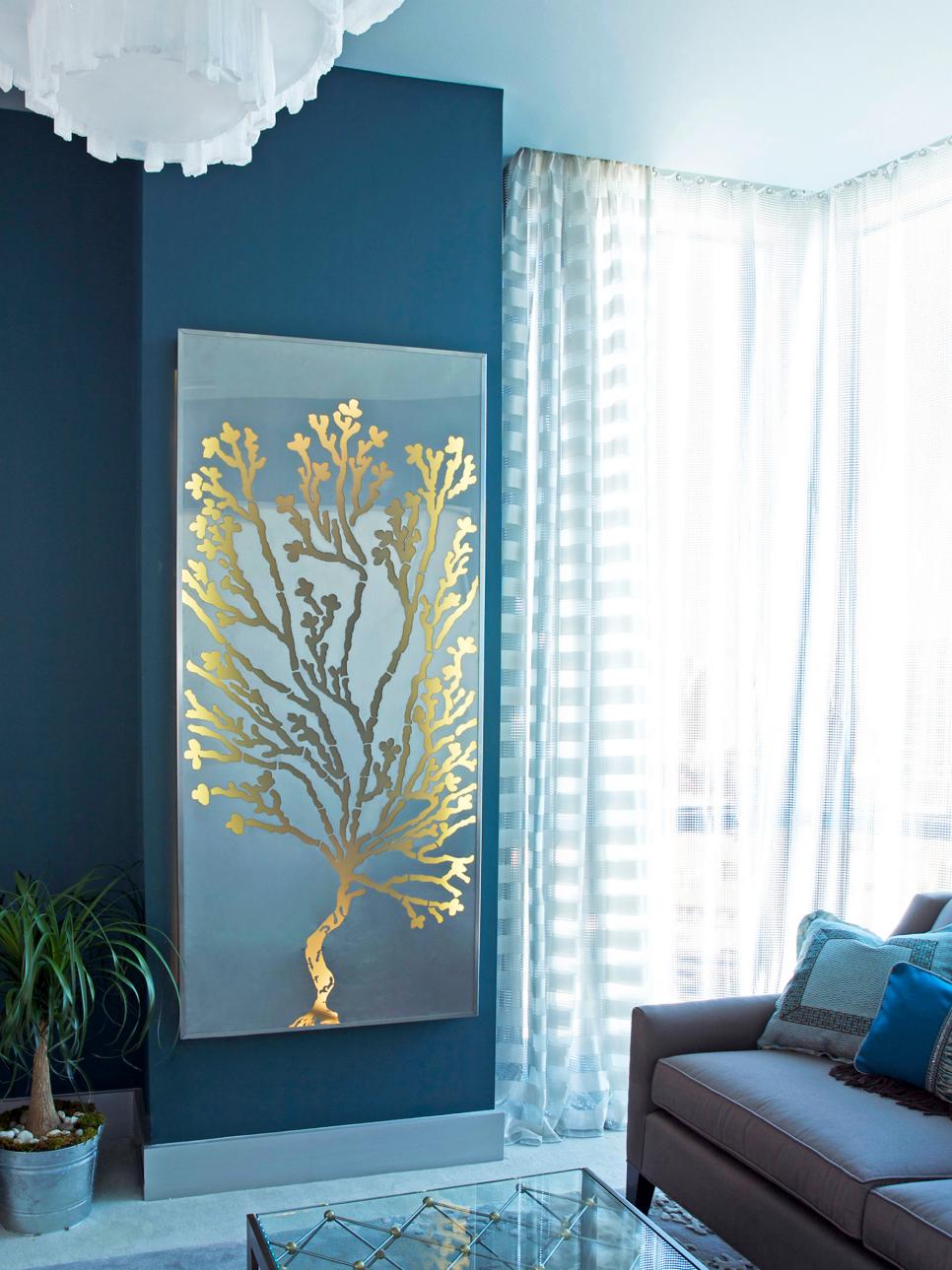 Blue Contemporary Living Room With Gray Curtains and Gold Artwork