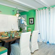 Green Cottage Dining Room with Flowing Drapes
