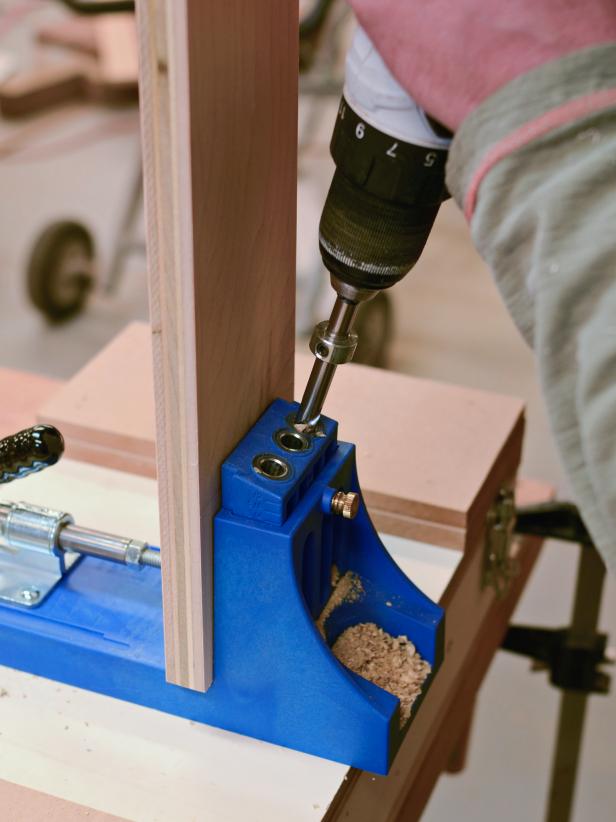 When assembling your custom range hood, use a pocket-hole jig and drill equipped with a pocket-hole drill bit to drill holes into poplar pieces that connect to front and side panels.