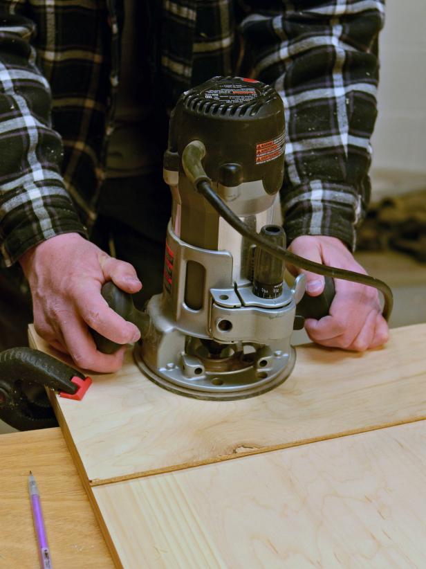 When working on a custom project it's important to sand cut edges smooth. Position template over bottom of front panel and clamp into place with bar clamps. Use router equipped with a shank-side bearing flush-trim bit and let it ride along template to cut arch