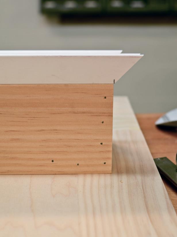 When creating the shelf for your custom range hood, cut trim ends at a 45-degree bevel to the same width as the shelf. Measurement should be taken from the shortest point on trim to fit properly. Cut side shelf side pieces with one 45-degree beveled angle and one straight cut.