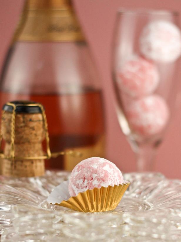 Make your wedding toast even sweeter with pink champagne truffles. Display them in foil candy wrappers for extra eye appeal.
