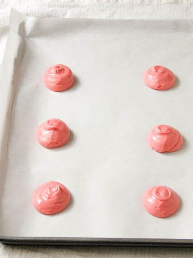Pipe whoopie pie batter into heaped 2" rounds widely spaced on the baking sheet, about 6 cakes to a pan.