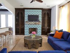 Blue and Brown Moroccan Sitting Room With Chevron Fireplace