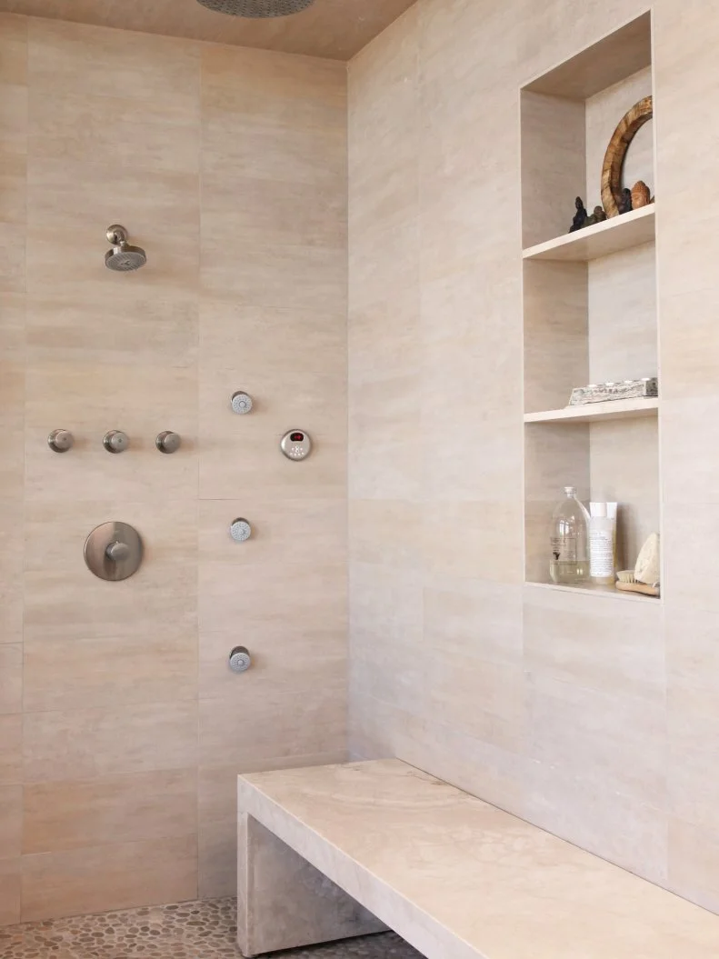 Large Shower With Beige Marble Tile and Stone Medallion Flooring