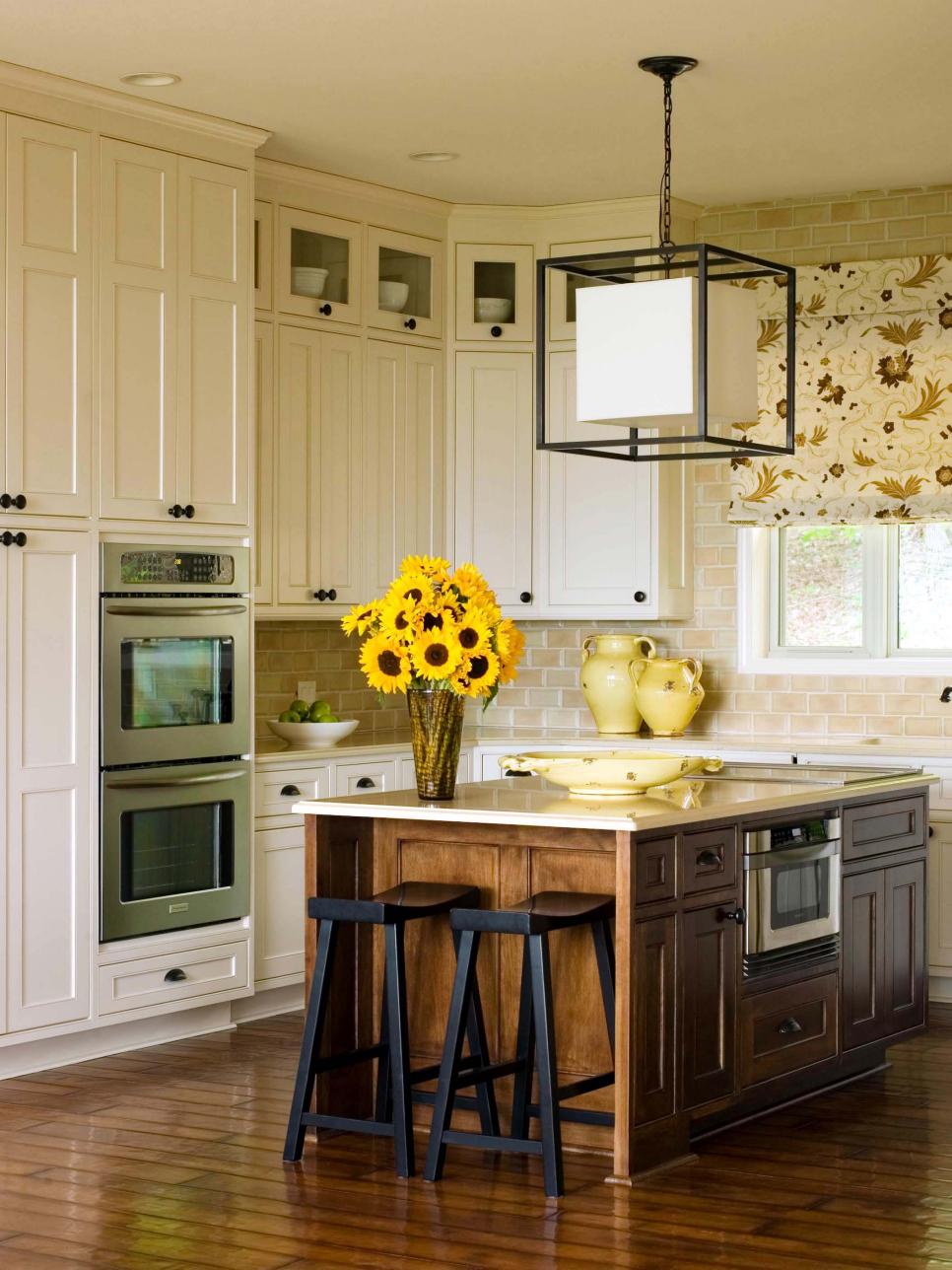 Neutral Transitional Kitchen With Cube Light Fixture and Large Island