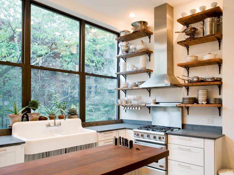 Kitchen with large windows and open shelving