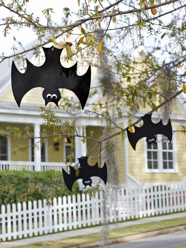 Looking for a fun and inexpensive way to add a little spooky to your yard or porch this Halloween? All you need is some black craft foam, googly eyes and fishing line to create a flock of wild, weatherproof bats.