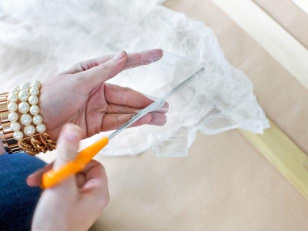 Use a tape measure to determine each panel's height and width then cut fabric.