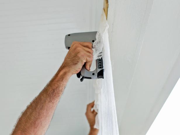Hold poplar strips up to necessary walls or beams, then attach securely with staples and staple gun.