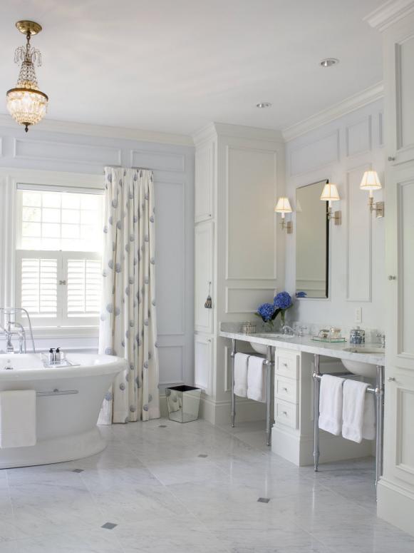 Luxurious All White Bathroom With Tall Cabinetry Luxurious All White Bathroom With Tall Cabinetry