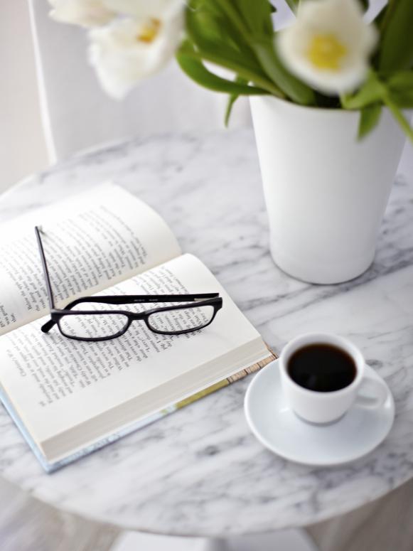 White Marble Tabletop With Book and Glasses White Marble Tabletop With Book and Glasses