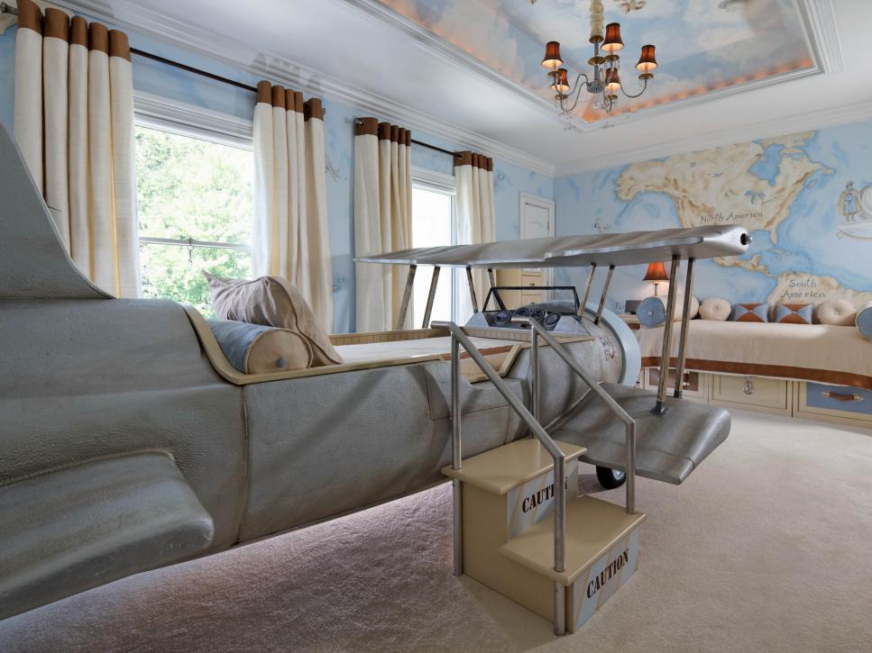 Travel-Inspired Kids' Bedroom With Map Murals, Airplane Bed and Daybed
