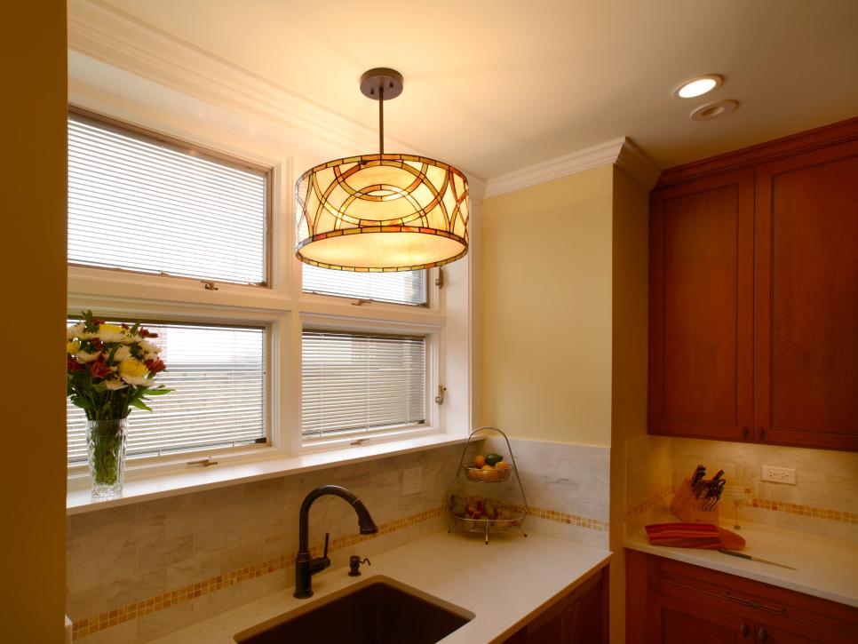 Neutral Kitchen With Pendant Light Over Recessed Sink