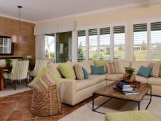 Designer Kerrie Kelly gave this transitional living space a tropical feel as a nod to the family's Hawaiian roots.