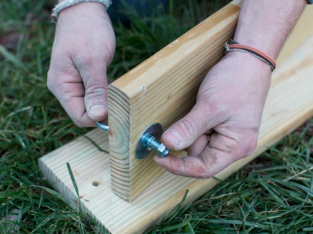 Attach Exterior Lag Eye Screws to Swing SeatUse measuring tape and pencil to measure and mark placement of exterior lag eye screws along swing seats.
