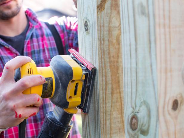 Prepare all wood surfaces for paint or stain by smoothing down rough areas with orbital sander.